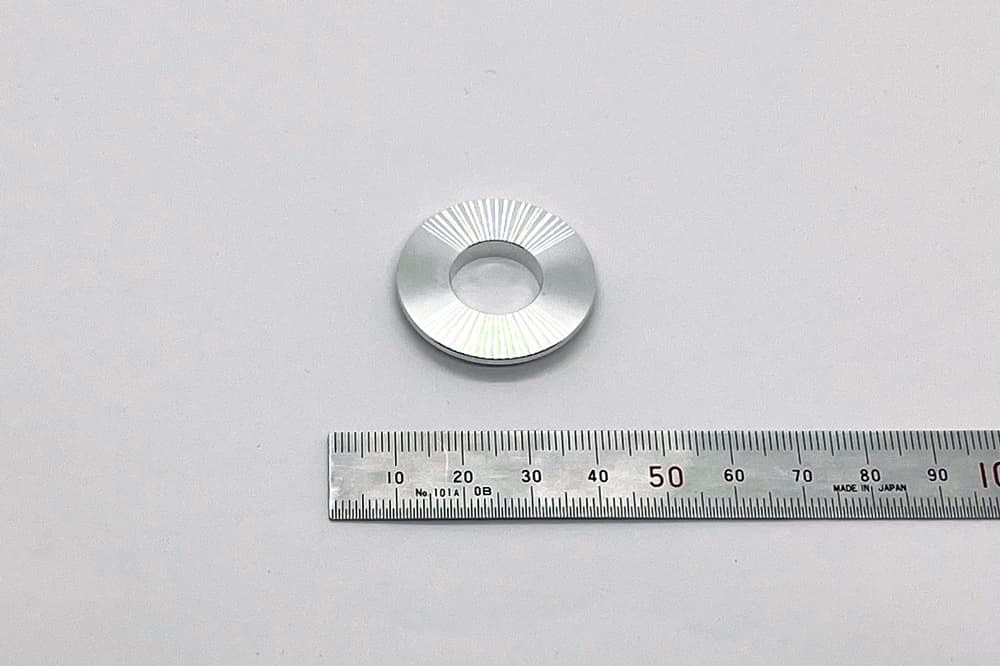 アルミ製つまみカバー部品